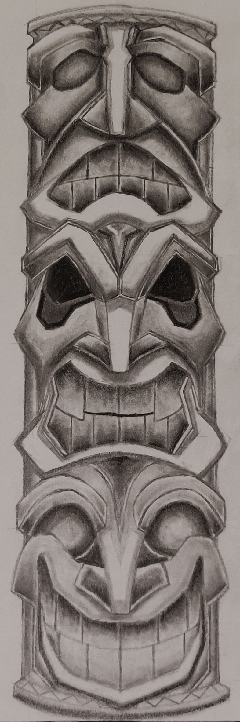 A drawing of a totem pole in pencil.